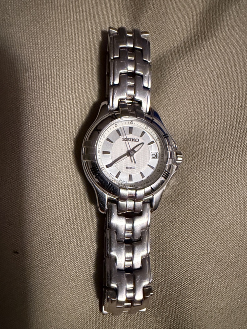 Seiko silver-tone stainless steel watch with white dial